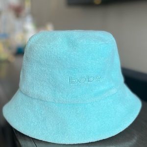Light baby blue bucket hat. Bebe brand. Used maybe twice. In great condition.